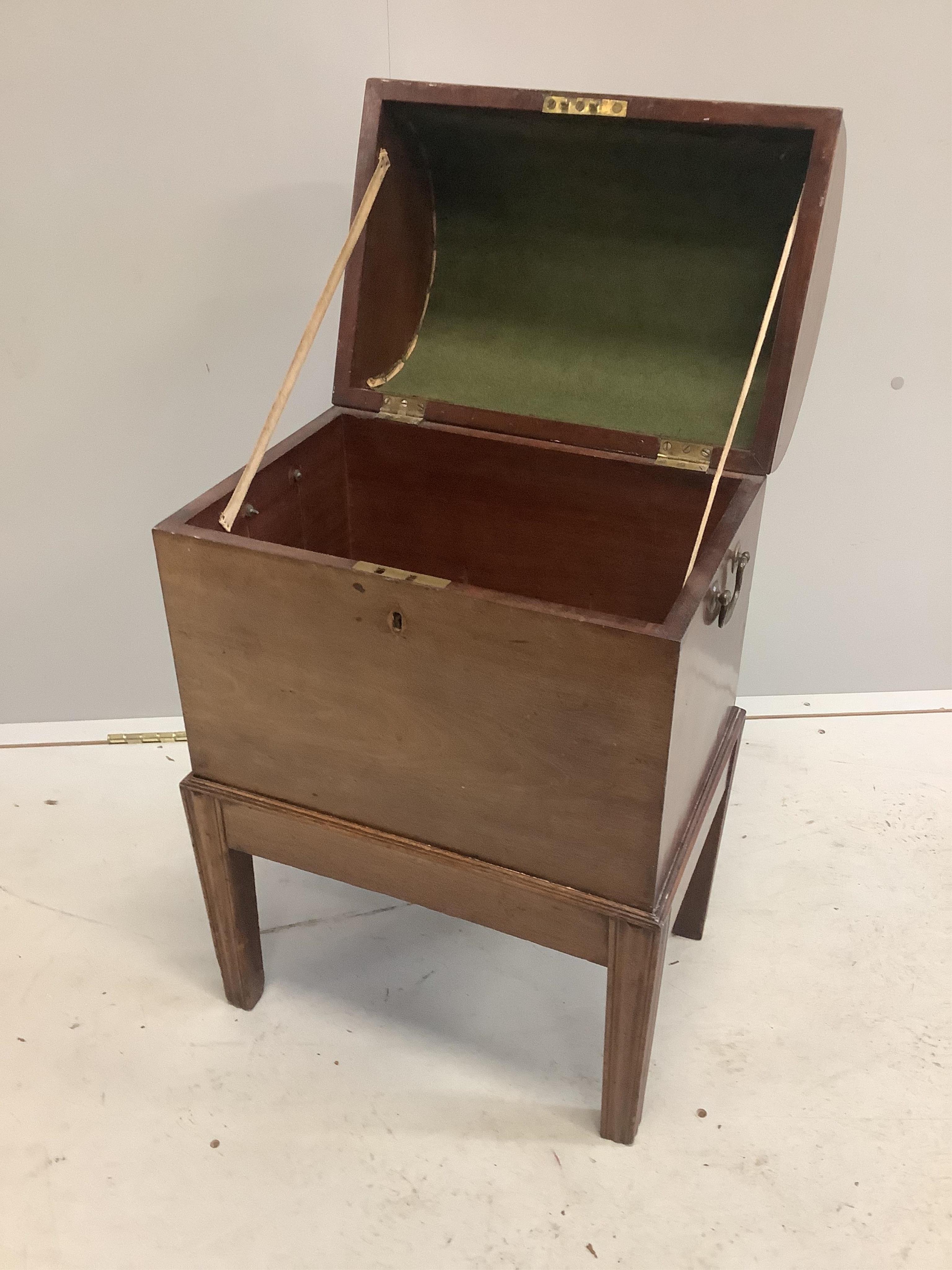 A 19th century mahogany domed top cellarette, width 43cm, depth 30cm, height 70cm. Condition - fair